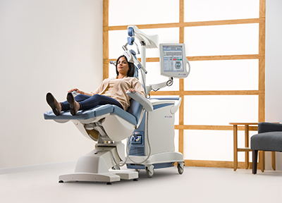 NeuroStar Advanced Therapy Step One: Patient reclines in treatment chair
